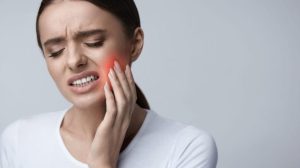 أعراض حساسية الأسنان بعد تركيب التاج